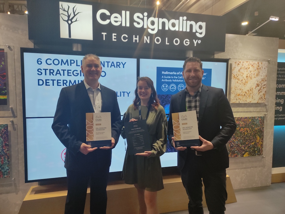 Cell Signaling Technology receiving their award