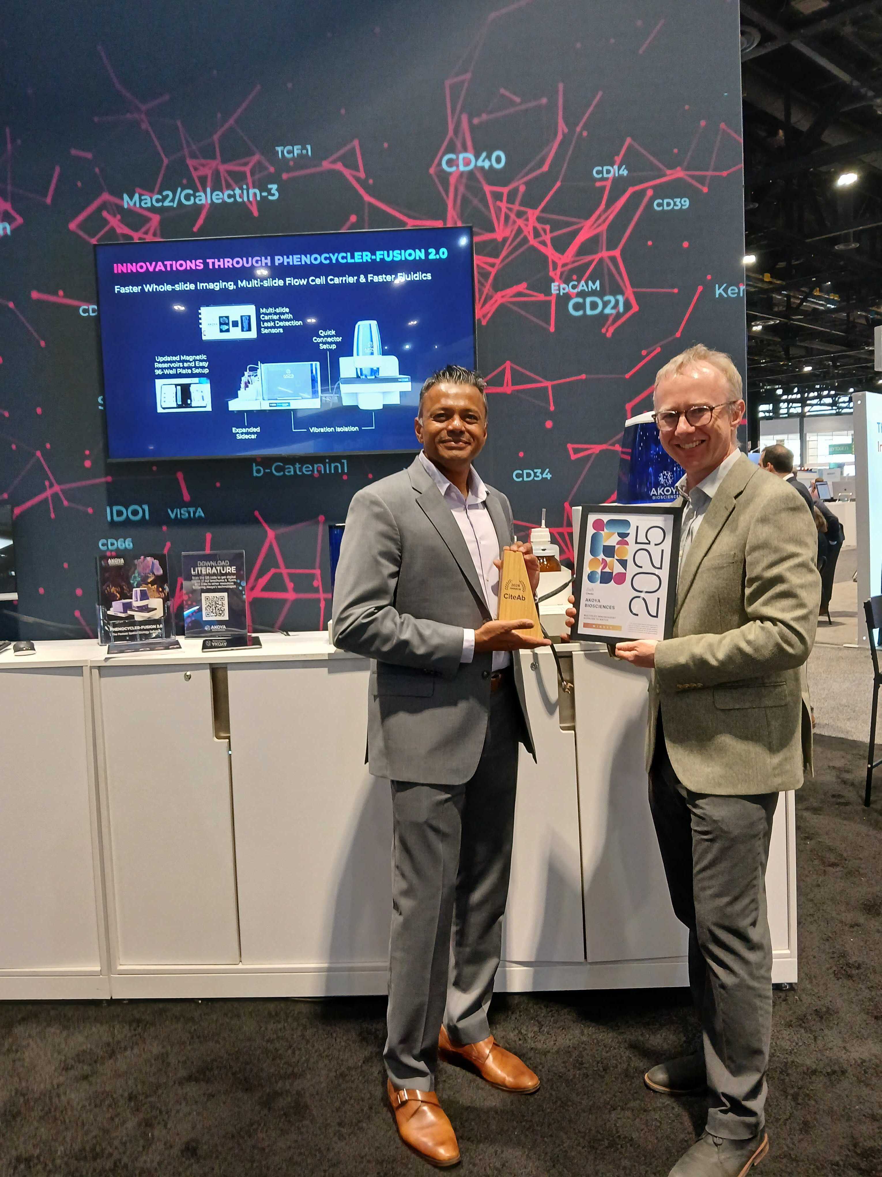 Akoya receiving their award