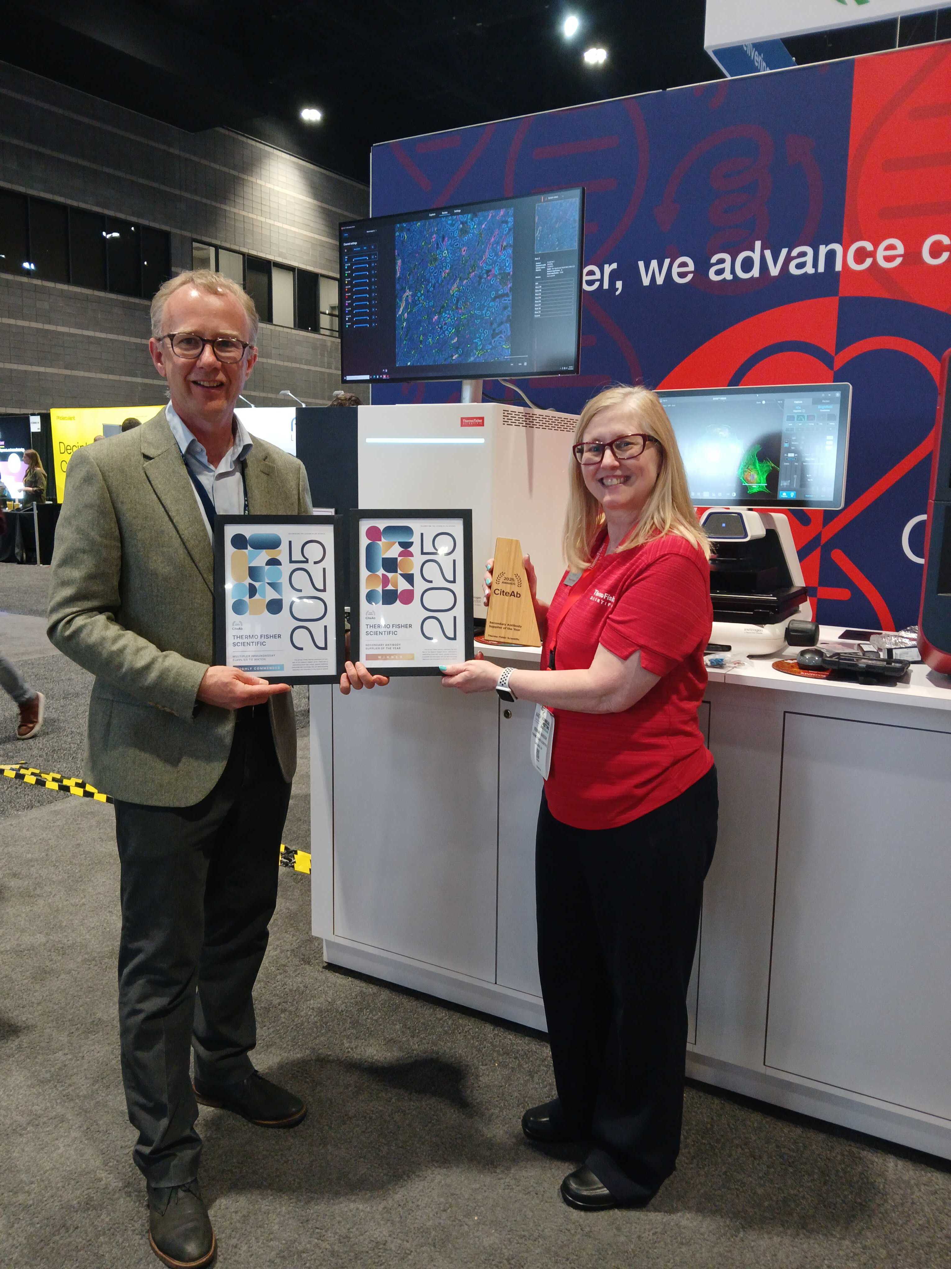 Thermo Fisher Scientific receiving their award