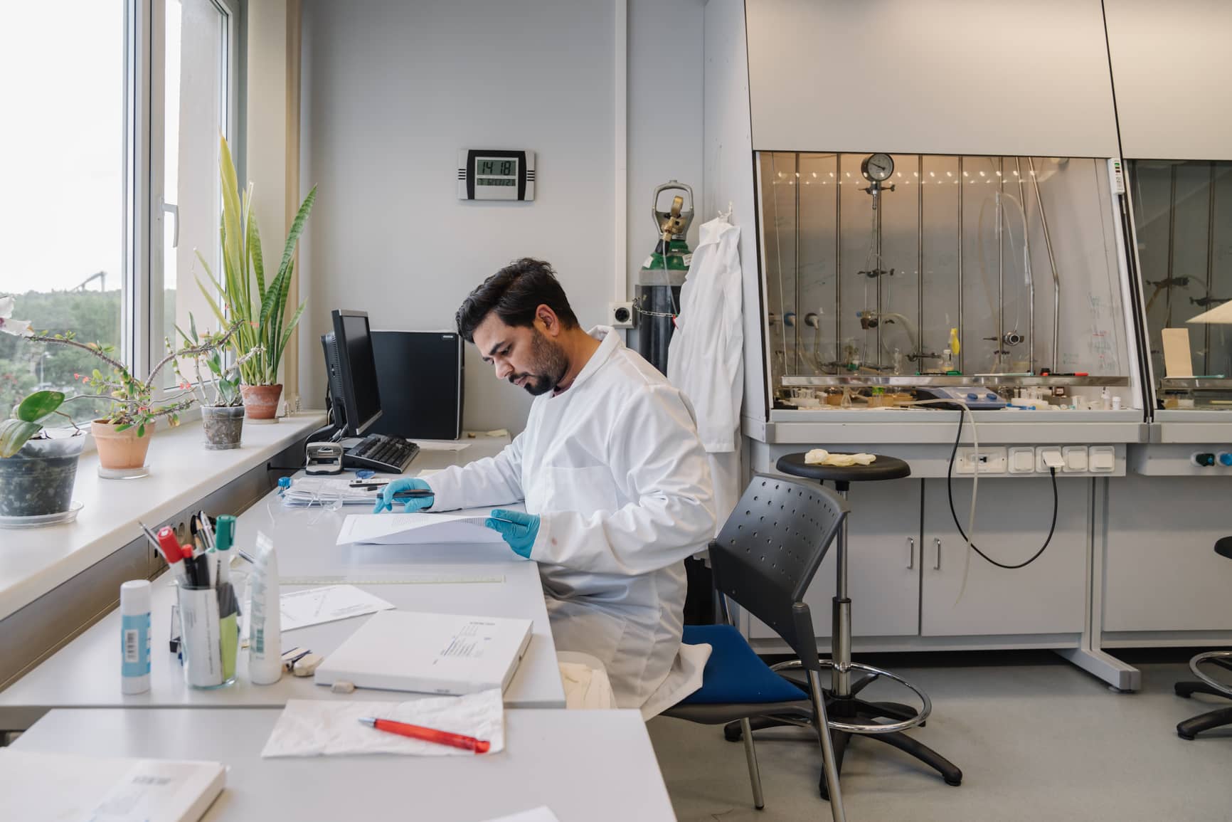 Researcher Analyzing Data In A Bright Laboratory